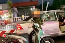 Ly do bat ngo nguoi phu nu tat dau oto, dap be kinh xe tren pho hinh anh