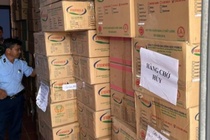 Phat hien kho chua gan 12.000 lon sua bot khong ro nguon goc o Long An hinh anh