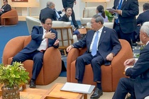 Thu tuong Pham Minh Chinh gap Thu tuong Quoc vu vien Trung Quoc hinh anh