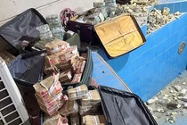 Phat hien 14 trieu USD giau trong tuong nha Thu truong Dau mo Iraq hinh anh