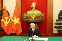 Tong bi thu, Chu tich nuoc dien dam voi Thu tuong Nhat Suga Yoshihide hinh anh