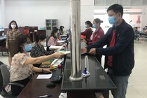 Nguoi dan co the dat truoc lich lam viec voi BHXH Binh Duong hinh anh