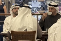 Buoi ca phe 'chua tung co tien le' cua Tong thong UAE va Thai tu Dubai hinh anh