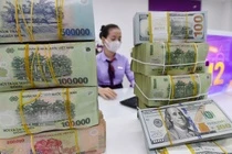 Thay doi ve luong toi thieu vung sau sap nhap tinh thanh tu 1/7 hinh anh