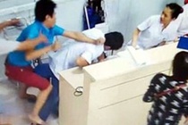 Chong san phu goi 15 nguoi den hanh hung bac si bi phat 9 thang tu hinh anh