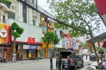 Cong an kham xet nha Tuan 'than den' hinh anh