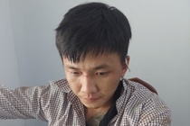 Tam giu thanh nien cuop giat tai san lam nguoi phu nu te xuong duong hinh anh