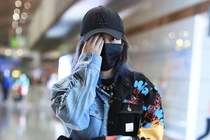 Trieu Vy tranh ne sau tin hen ho thieu gia hinh anh