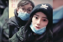Doi dong tinh nu quyet o lai Vu Han du bi cach ly vi corona hinh anh