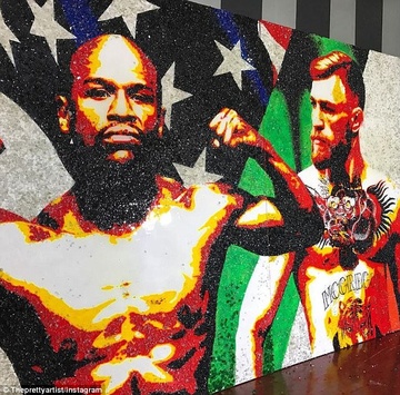 Mayweather khoe buc tranh khong lo ve dai chien voi McGregor hinh anh