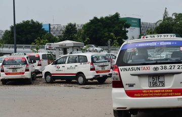 Bo Cong Thuong dang xem xet viec dan khau hieu phan doi Uber, Grab hinh anh
