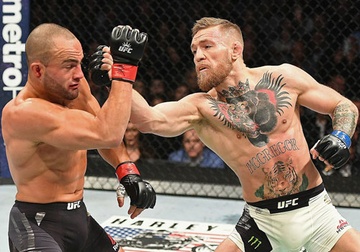 Ha knock-out doi thu, ‘ga dien’ McGregor di vao lich su UFC hinh anh