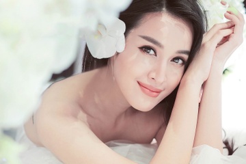 Tu Vi dien dam cuoi ren trang quyen ru hinh anh