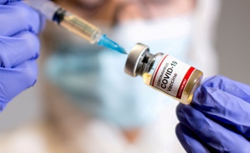 Vaccine da ngan chan hon 100.000 cai chet vi Covid-19 o Anh hinh anh