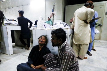 Giam dap khi nhan thuc pham o Pakistan, 13 nguoi chet hinh anh