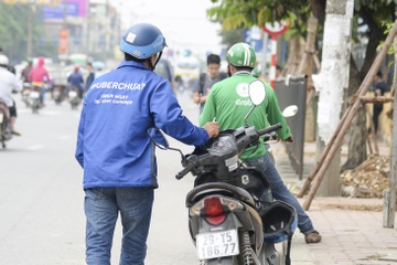 Kho song, vi sao xe om khong chay het qua Uber, Grab? hinh anh