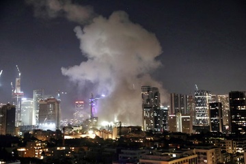 Iran dap tra, Tel Aviv hung loat ten lua luc rang sang hinh anh