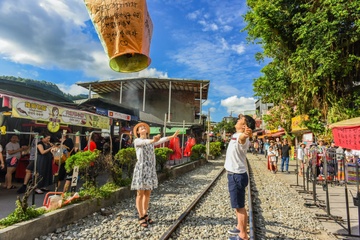 Dai Loan tang tien cho khach du lich hinh anh