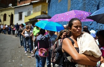 Venezuela phat hon 4.000 tan luong thuc cho nguoi dan hinh anh