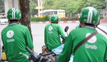 Grab, Go-Viet tang phu phi dat xe dip Tet Nguyen dan tu hom nay hinh anh