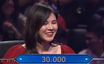 Gai xinh xuat hien o 'Ai la trieu phu' hoa ra la MC the thao quen mat hinh anh