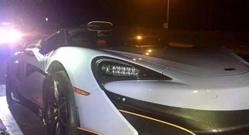 Moi nhan xe 10 phut, sieu xe McLaren bi canh sat tam giam hinh anh