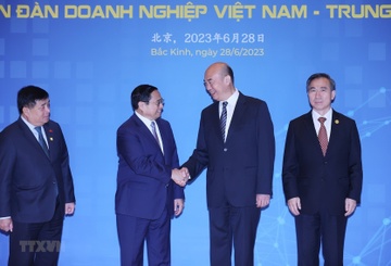 Thu tuong du Dien dan hop tac dau tu, thuong mai Viet Nam - Trung Quoc hinh anh
