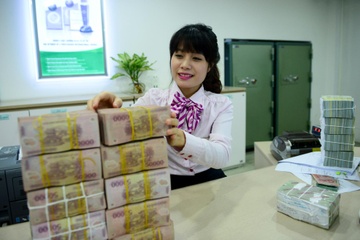 Nhan vien ngan hang 'ngong' ngay nghi hon thuong Tet hinh anh