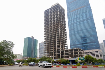 Toa nha nghin ty cua Tong cong ty Xi mang bo hoang sau 8 nam khoi cong hinh anh