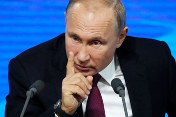 Ong Putin canh bao My khong nen tung don cam van moi hinh anh