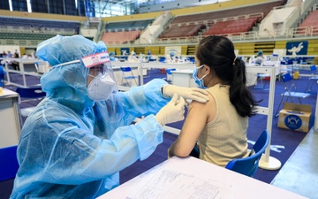 Ca nhiem nCoV o TP.HCM tung den tiem vaccine tai truong tieu hoc hinh anh