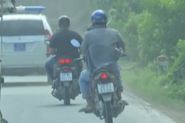 'Chim moi' canh gioi cho xe qua tai ne CSGT o Binh Duong hinh anh