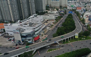 Cau vuot Nguyen Huu Canh tung gap nhieu su co, phai chi tien ty de sua hinh anh