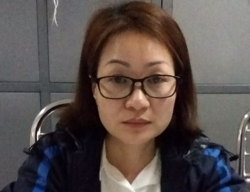 Nu can bo ngan hang tham o tien ty tron truy na vao Sai Gon hinh anh