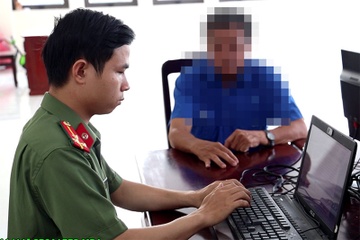 Mao danh Cong an thao tung tam ly nan nhan, chiem doat hon nua ty dong hinh anh