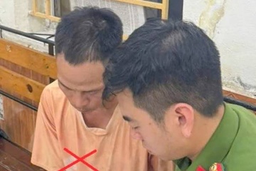 Tạm giữ hình sự ông bố buộc xích, kéo lê con trai trên phố ở Hải Phòng