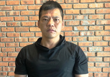 Tam giu nguoi dan ong Trung Quoc tron lenh truy na o Da Nang hinh anh