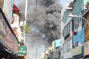 Chay nha 3 tang trong hem o TP.HCM hinh anh