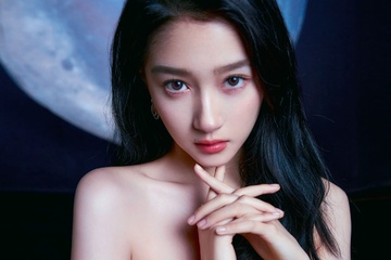 Trung Quoc cam nghe si vuong be boi nhan quang cao hinh anh