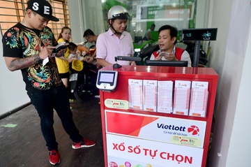 Nha nuoc se doc quyen phat hanh ve so, san xuat vang mieng? hinh anh