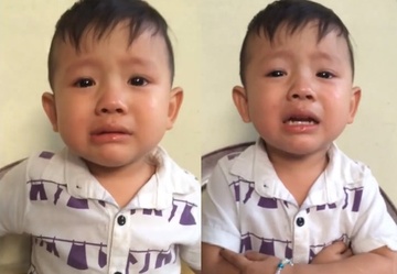Cau be dang yeu vua meu mao vua hat 'Gui anh xa nho' hinh anh