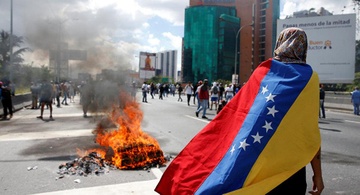 Tong thong Trump: Nga noi 'da rut phan lon nguoi khoi Venezuela' hinh anh