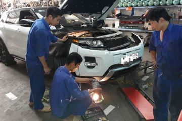 Nang nong ky luc, garage sua xe boi thu tram trieu moi ngay hinh anh