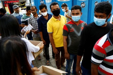 Nguoi TQ nhiem virus doi mat an tu vi noi doi nha dieu tra Singapore hinh anh
