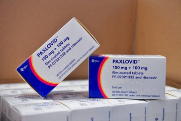 Nhat Ban phe duyet thuoc dieu tri Covid-19 dang uong cua Pfizer hinh anh