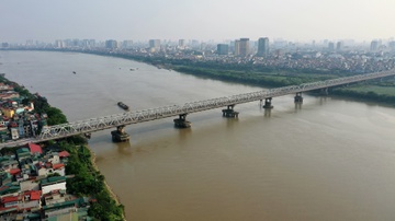 Cau Chuong Duong dang xuong cap hinh anh