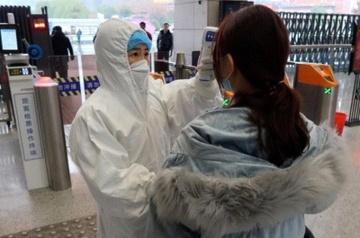 Nu le tan nhiem virus corona tu nguoi Vu Han qua duong ho hap hinh anh