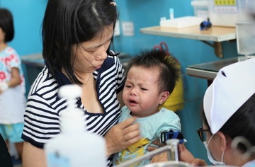 Tien do tiem vaccine bach hau o TP.HCM cham do dich Covid-19 hinh anh