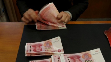 Chuyen gia TQ giuc in them tien de doi pho chien tranh thuong mai hinh anh