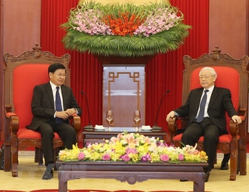 Tong bi thu, Thu tuong tiep Thu tuong Lao Thongloun Sisoulith hinh anh